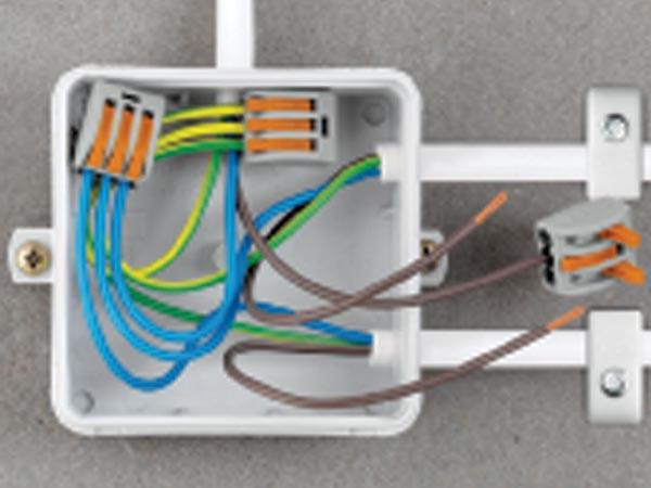Adaptateur de fixation pour connecteurs de 2 ? 5 poles, orange